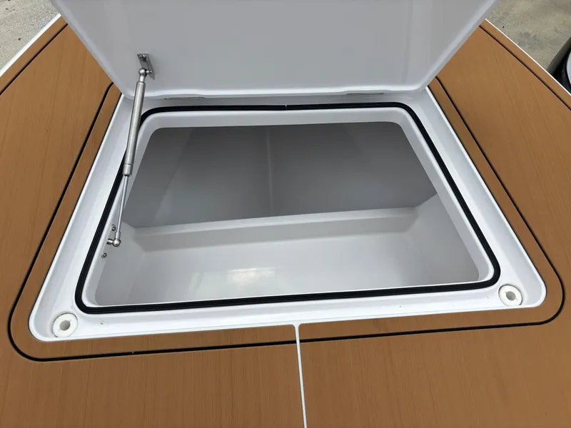 Slide: The Image of Open storage compartment on 2024 Vtech 18 FLATS boat deck. - 41