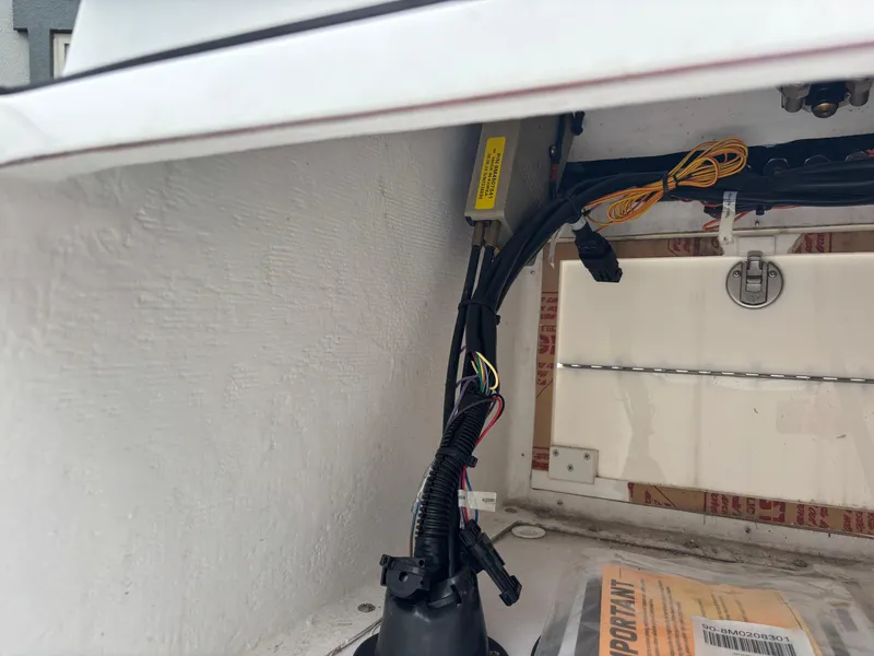 Slide: The Image of Interior view of Vtech 18 FLATS 2024 boat wiring and components. - 46