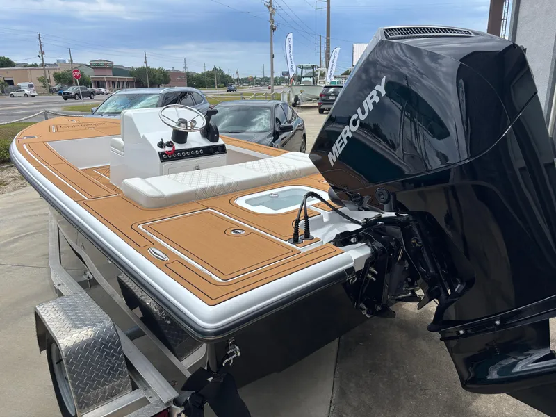 Slide: The Image of 2024 Vtech 18 FLATS boat with Mercury engine on a trailer. - 5
