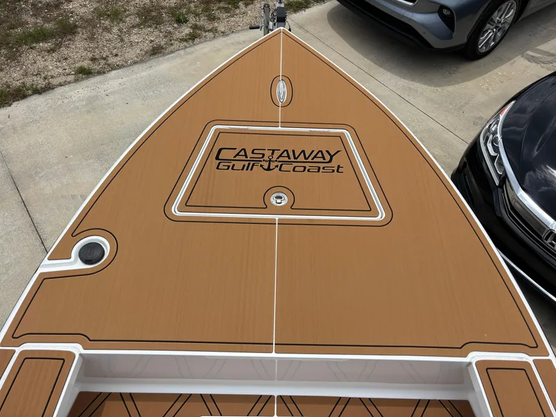 Slide: The Image of Bow of 2024 Vtech 18 FLATS boat with "Castaway Gulf Coast" logo on deck. - 9