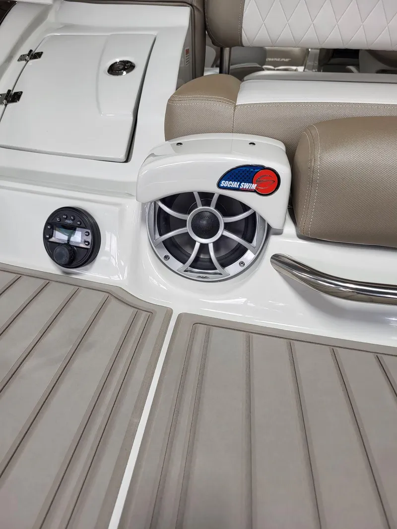 Slide: The Image of 2023 Crownline 260 SS boat interior with speaker and seating detail. - 10