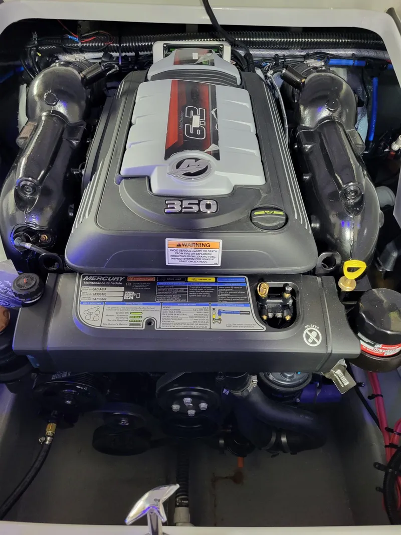 Slide: The Image of 2023 Crownline 260 SS engine, featuring a powerful 6.2L 350 horsepower motor. - 16