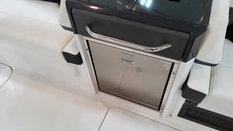 Slide: The Image of 2025 Formula 330 Crossover Bowrider interior with built-in cooler. - 16