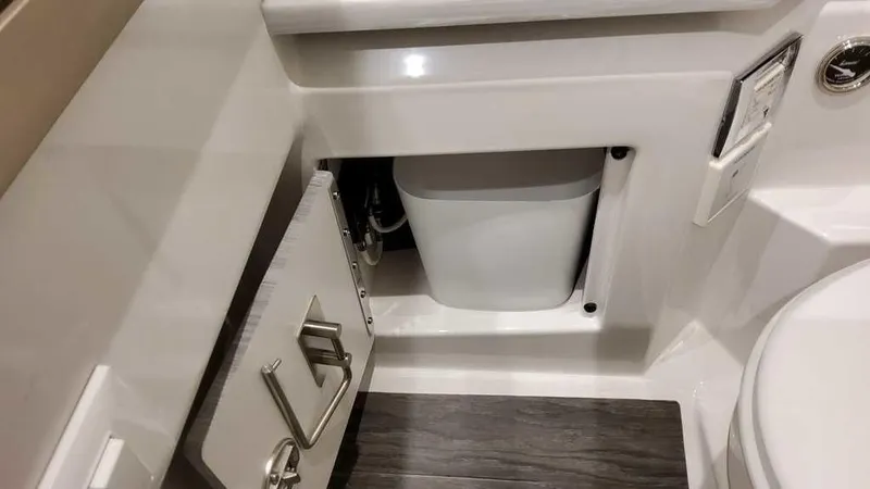 Slide: The Image of 2025 Formula 330 Crossover Bowrider bathroom with sleek cabinetry and modern fixtures. - 33