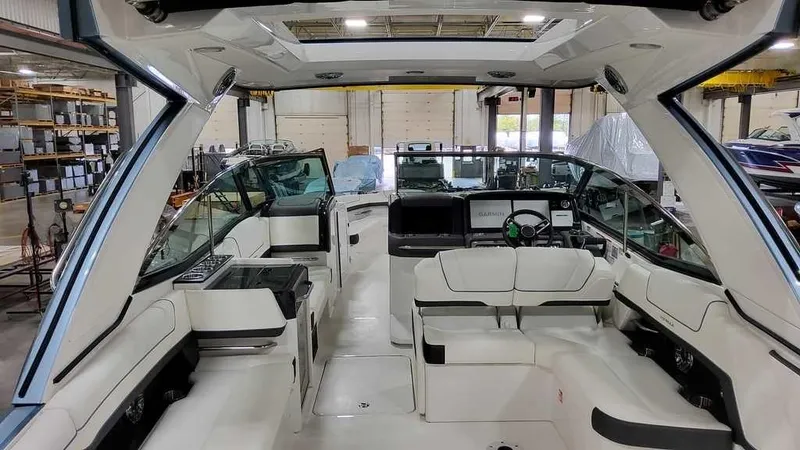 Slide: The Image of 2025 Formula 330 Crossover Bowrider interior, featuring luxurious seating and modern design. - 38