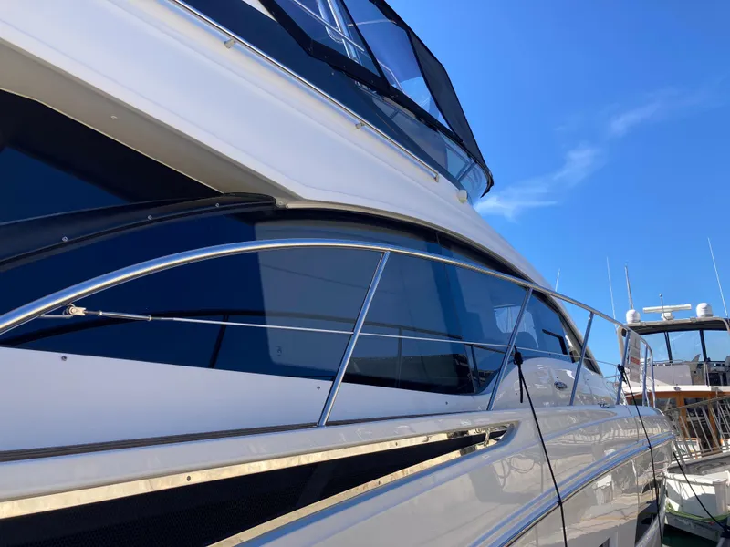 Slide: The Image of 2018 Sea Ray Fly 510 yacht with sleek design and modern features. - 26