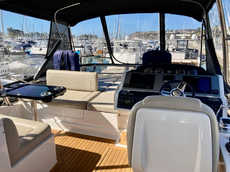 Slide: The Image of Luxurious 2018 Sea Ray Fly 510 yacht interior with modern helm and seating. - 45