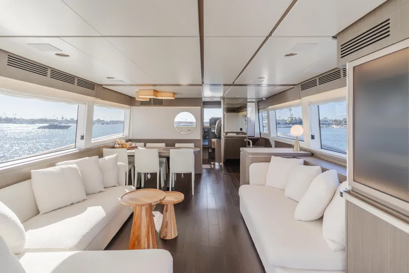 Slide: The Image of Luxurious interior of 2023 Azimut Magellano 66 yacht with elegant seating and ocean views. - 38