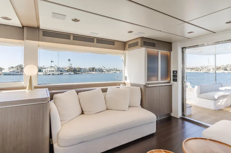 Slide: The Image of Luxurious interior of 2023 Azimut Magellano 66 yacht with waterfront view. - 40