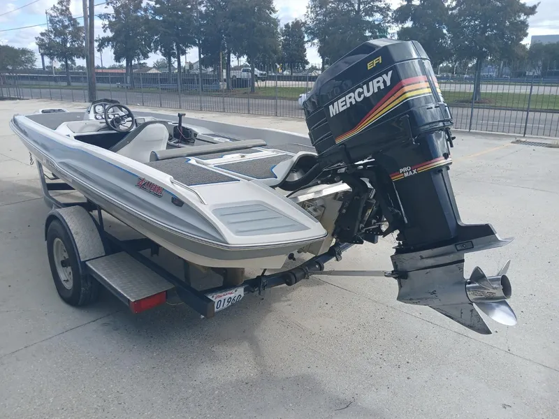 Slide: The Image of 1988 Allison 2002 XB boat with Mercury Pro Max engine on trailer. - 10