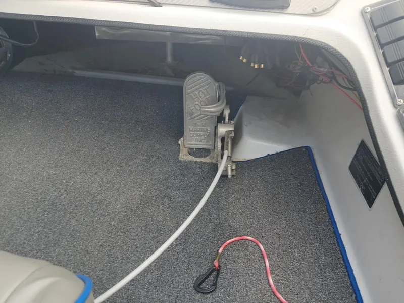 Slide: The Image of Interior of 1988 Allison 2002 XB boat with foot pedal and wiring. - 13