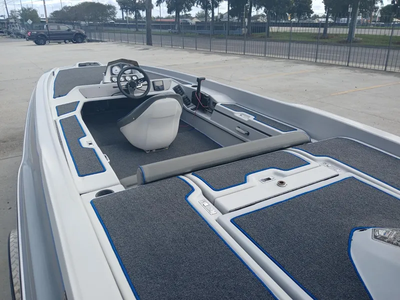 Slide: The Image of 1988 Allison 2002 XB boat interior with steering wheel and seating. - 7