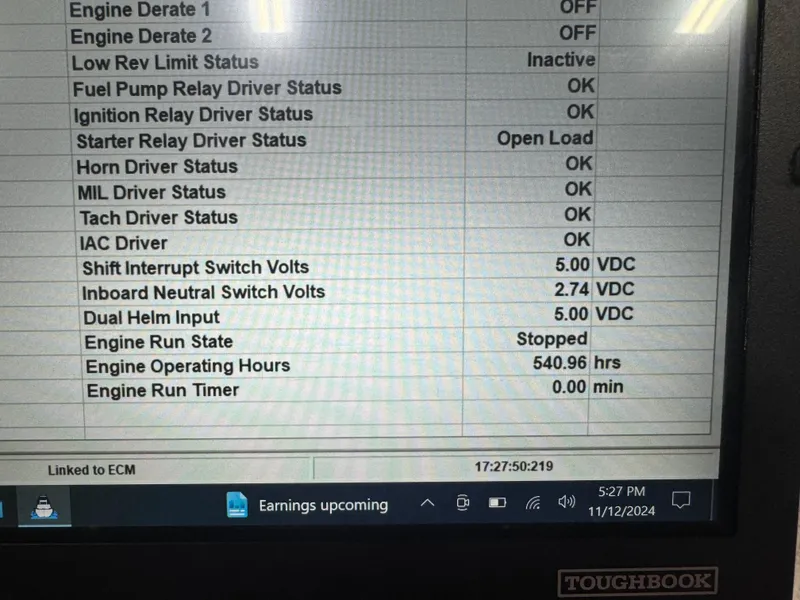 Slide: The Image of Diagnostic screen of a 2011 Regal 2500 LSR boat showing engine status and operating hours. - 17