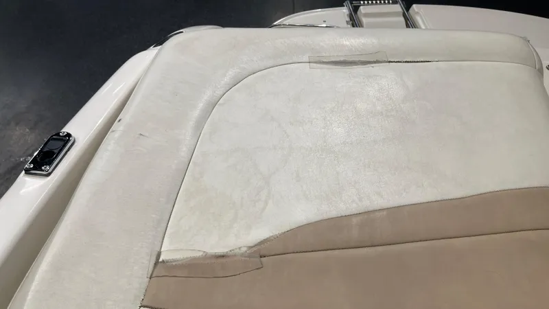 Slide: The Image of Worn upholstery on 2005 Chaparral 210 SSi boat seat. - 18