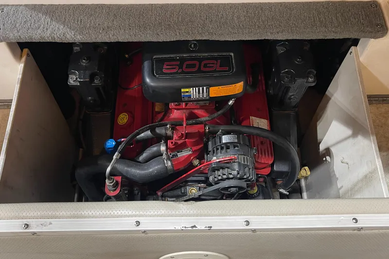 Slide: The Image of 2005 Chaparral 210 SSi engine compartment with 5.0 GL motor. - 27