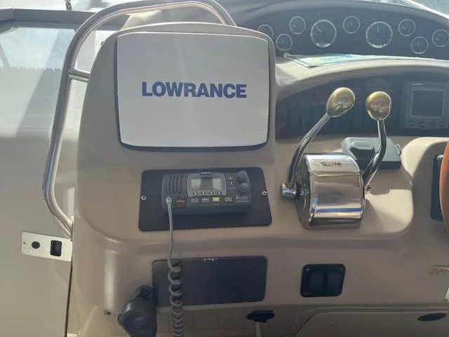 Slide: The Image of Control panel of 2000 Sea Ray 340 Sundancer with Lowrance navigation system. - 7