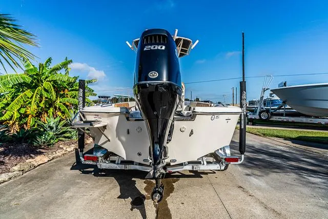Slide: The Image of 2025 Carolina Skiff 23LX boat with powerful 200HP engine on trailer. - 4