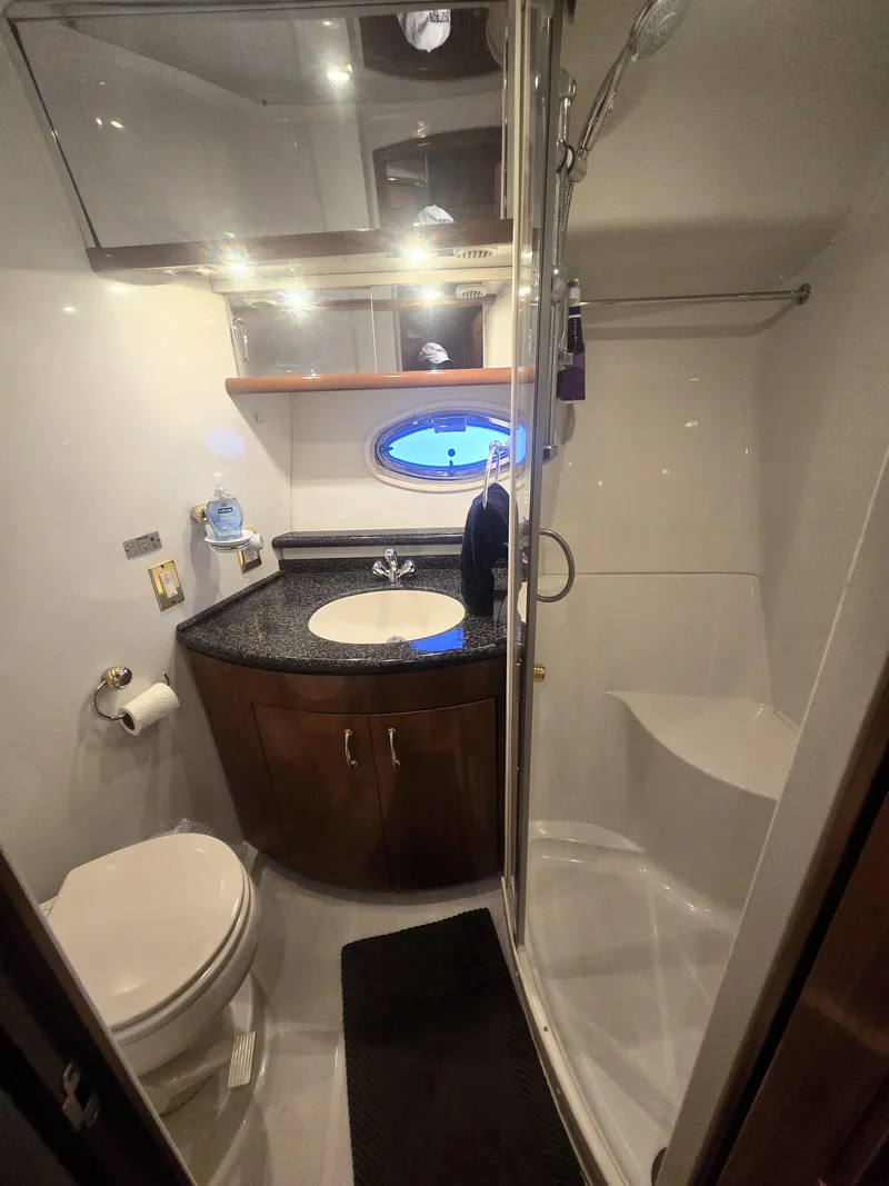 Slide: The Image of Luxurious bathroom in 2004 Carver 460 Voyager yacht with modern amenities. - 19