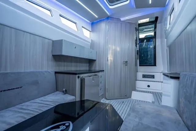 Slide: The Image of Luxurious interior of 2025 Statement 44 GTrs boat with modern design and ambient lighting. - 18