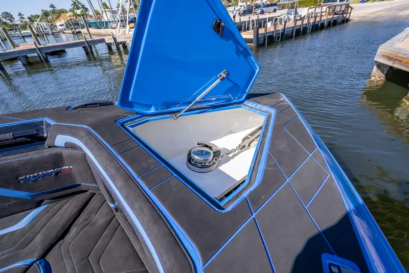 Slide: The Image of 2025 Statement 44 GTrs boat with open storage compartment at marina. - 33