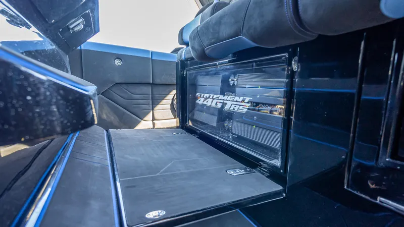 Slide: The Image of Interior of 2025 Statement 44 GTrs, showcasing sleek black design and luxury seating. - 35