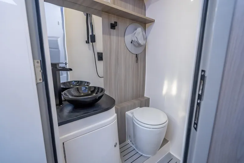 Slide: The Image of Modern bathroom in 2025 Statement 44 GTrs yacht with sleek fixtures and compact design. - 39