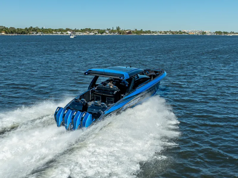 Slide: The Image of Blue 2025 Statement 44 GTrs speedboat cruising on open water. - 43