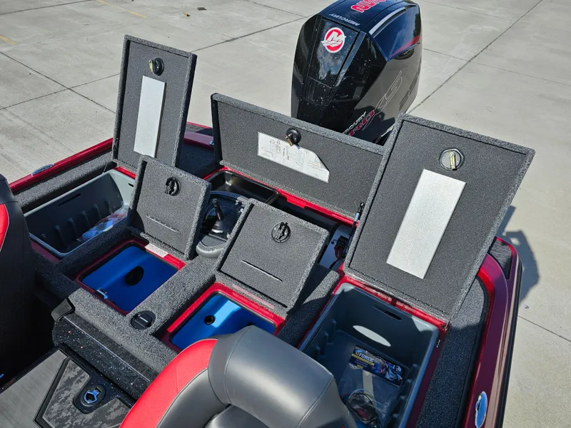 Slide: The Image of 2025 Nitro Z20 XL Pro boat storage compartments and engine detail. - 12