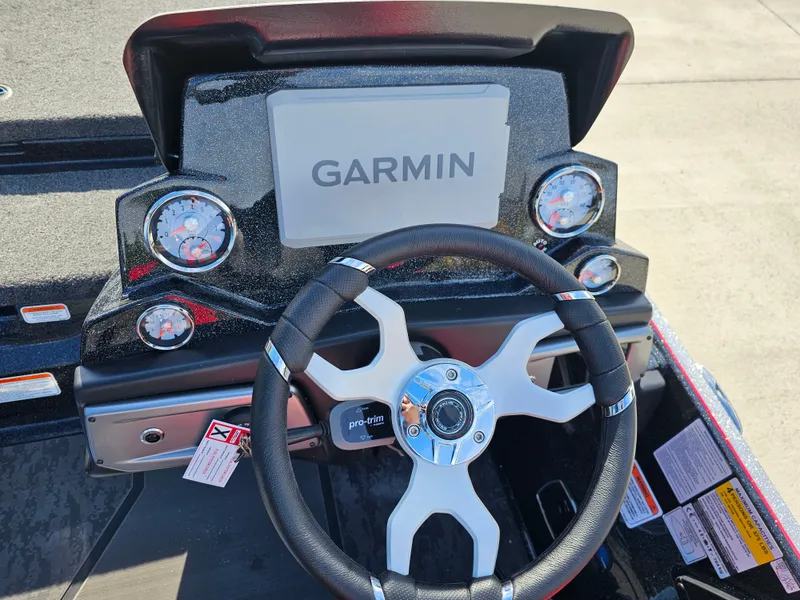Slide: The Image of 2025 Nitro Z20 XL Pro dashboard with Garmin display and steering wheel. - 18