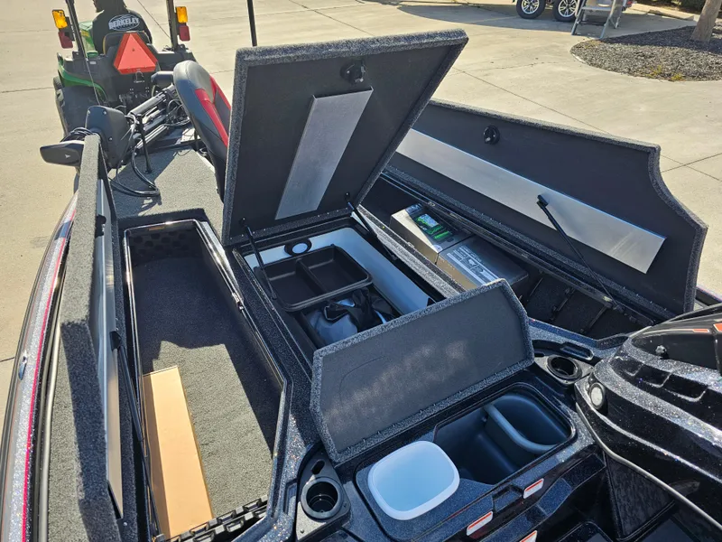 Slide: The Image of 2025 Nitro Z20 XL Pro boat with open storage compartments and seating. - 20