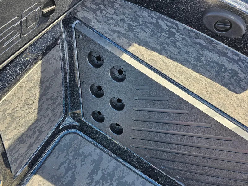 Slide: The Image of 2025 Nitro Z20 XL Pro boat interior with textured flooring and storage compartments. - 21