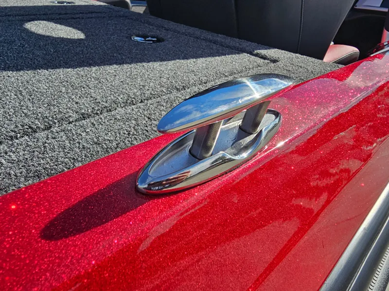 Slide: The Image of 2025 Nitro Z20 XL Pro boat with shiny red finish and chrome cleat. - 29