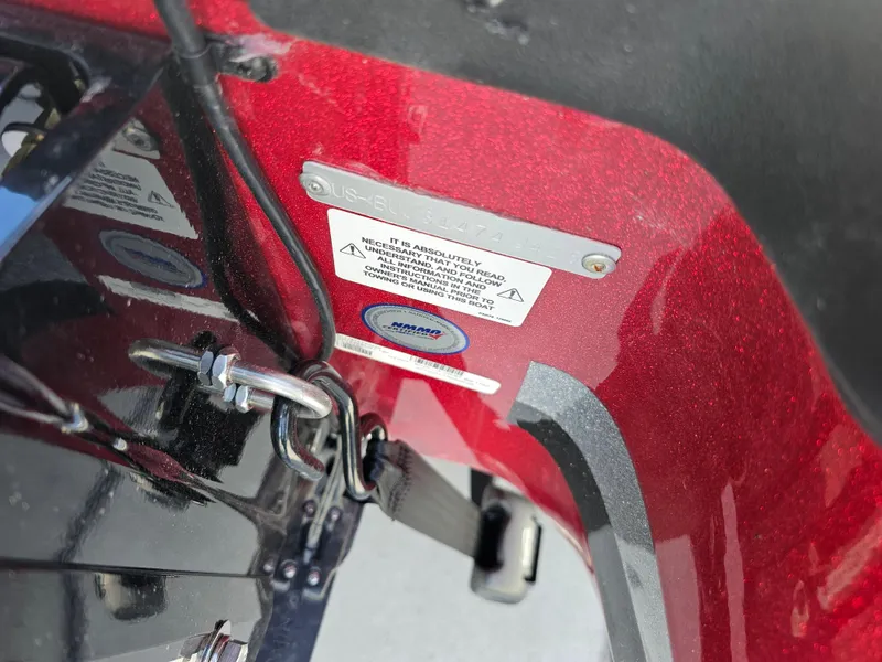 Slide: The Image of Close-up of a 2025 Nitro Z20 XL Pro boat component with safety label. - 30