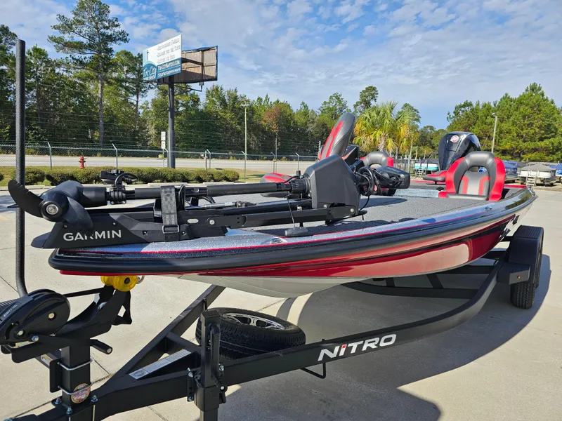 Slide: The Image of 2025 Nitro Z20 XL Pro bass boat on trailer, featuring Garmin equipment. - 5