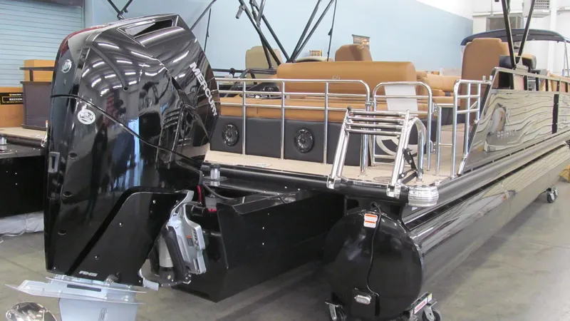 Slide: The Image of 2025 Regency 250 LE3 Sport pontoon boat with powerful Mercury outboard engine. - 4