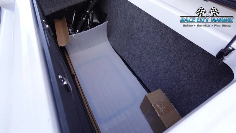 Slide: The Image of Storage compartment of 2025 Nautique Super Air Nautique S23 boat at Race City Marine. - 20