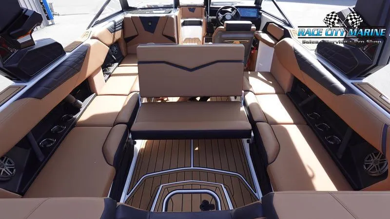 Slide: The Image of Luxurious interior of 2025 Nautique Super Air Nautique S23 boat. - 21