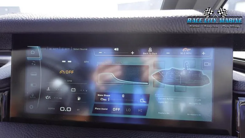 Slide: The Image of Touchscreen display of 2025 Nautique Super Air Nautique S23 boat controls. - 34