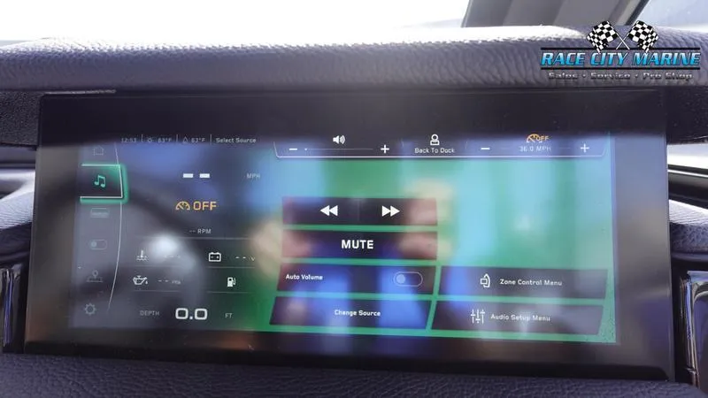 Slide: The Image of 2025 Nautique Super Air Nautique S23 touchscreen display with audio controls and settings. - 36