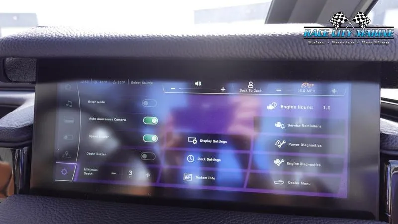 Slide: The Image of 2025 Nautique Super Air Nautique S23 touchscreen display with various control settings. - 40