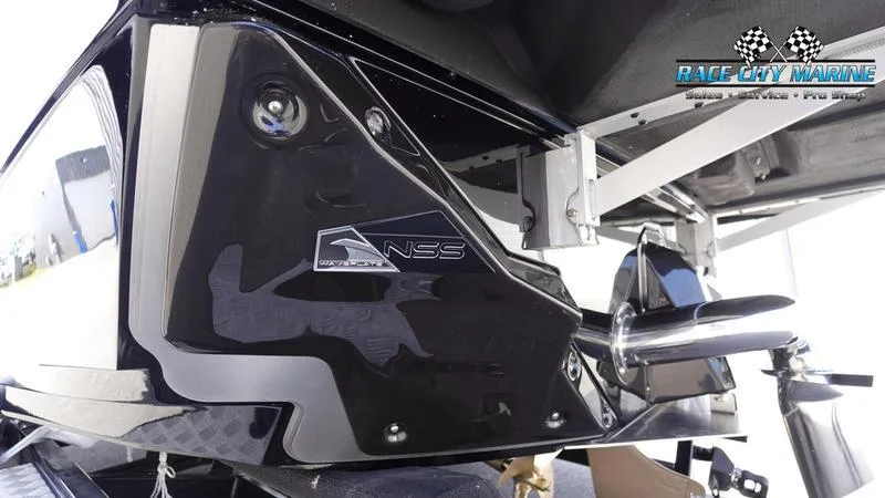 Slide: The Image of 2025 Nautique Super Air Nautique S23 boat rear view with NSS system. - 9