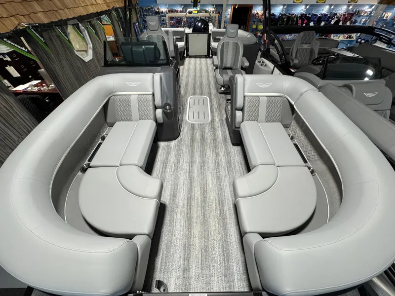 Slide: The Image of 2025 Bennington 22 MFB boat interior with luxurious gray seating and modern design. - 2