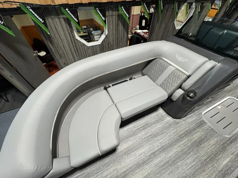 Slide: The Image of 2025 Bennington 22 MFB boat interior with gray cushioned seating and modern design. - 3