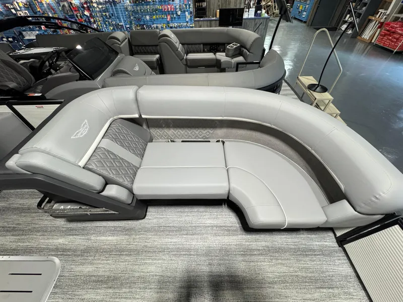 Slide: The Image of 2025 Bennington 22 MFB boat interior with luxurious gray seating. - 4