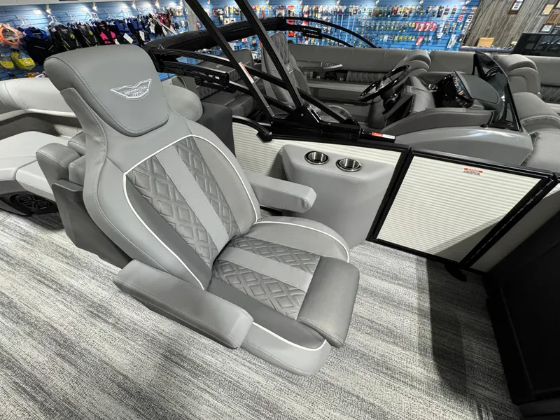 Slide: The Image of 2025 Bennington 22 MFB boat interior with luxurious gray seating and modern design. - 6