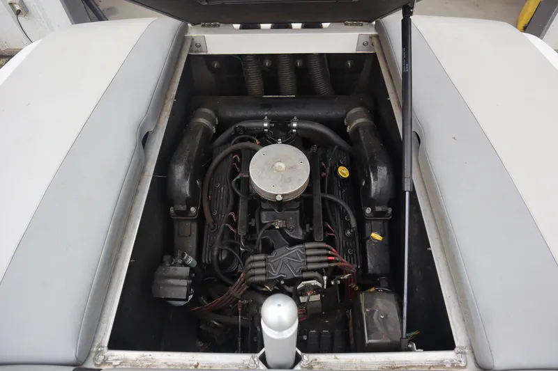 Slide: The Image of 2006 Moomba Outback LSV engine compartment with visible components and wiring. - 4