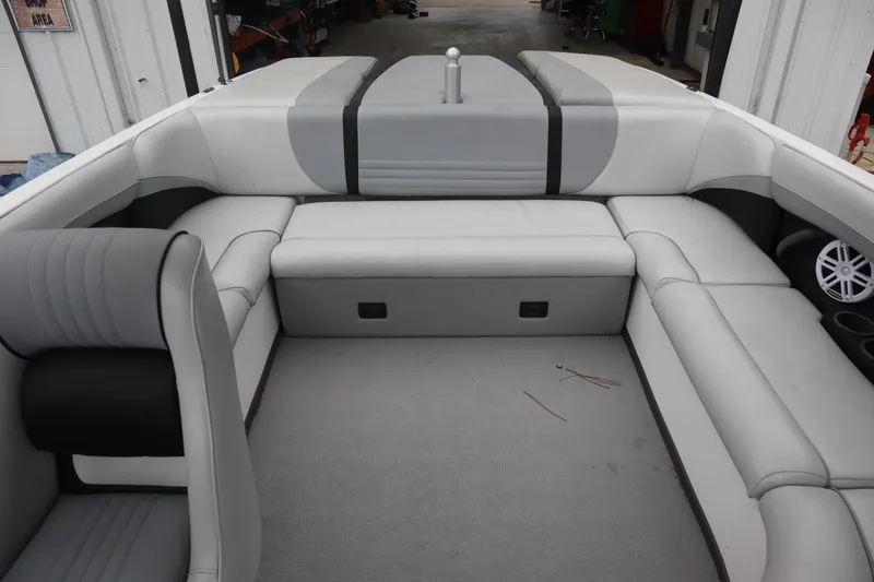 Slide: The Image of 2006 Moomba Outback LSV boat interior with gray and black seating arrangement. - 7