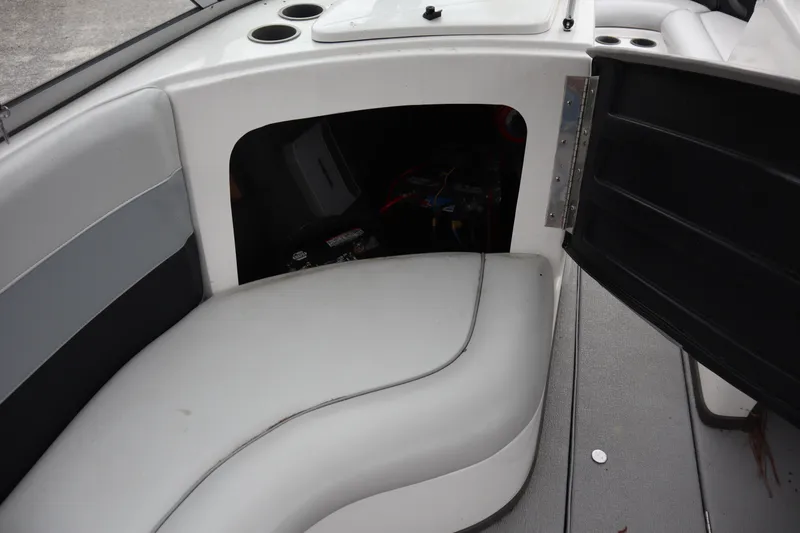 Slide: The Image of 2006 Moomba Outback LSV boat interior with open storage compartment. - 9