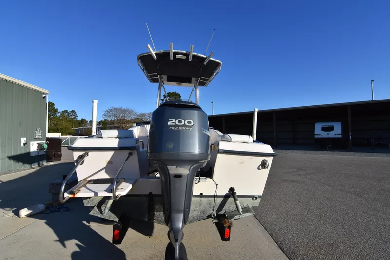 Slide: The Image of 2005 Grady-White Escape 209 boat with 200 horsepower engine in storage area. - 5