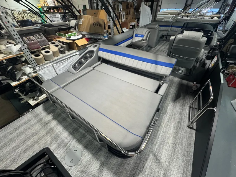 Slide: The Image of 2025 Bennington 24 LXSSB pontoon boat interior with spacious seating and modern design. - 12